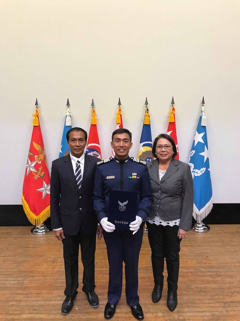 PROUD PARENTS. Capiz native Kennon Jan Aguilar's parents joined him for his graduation in March 2018.
  