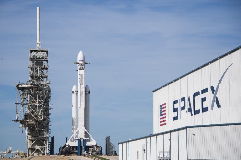 SpaceX delays plans to send tourists around Moon – report