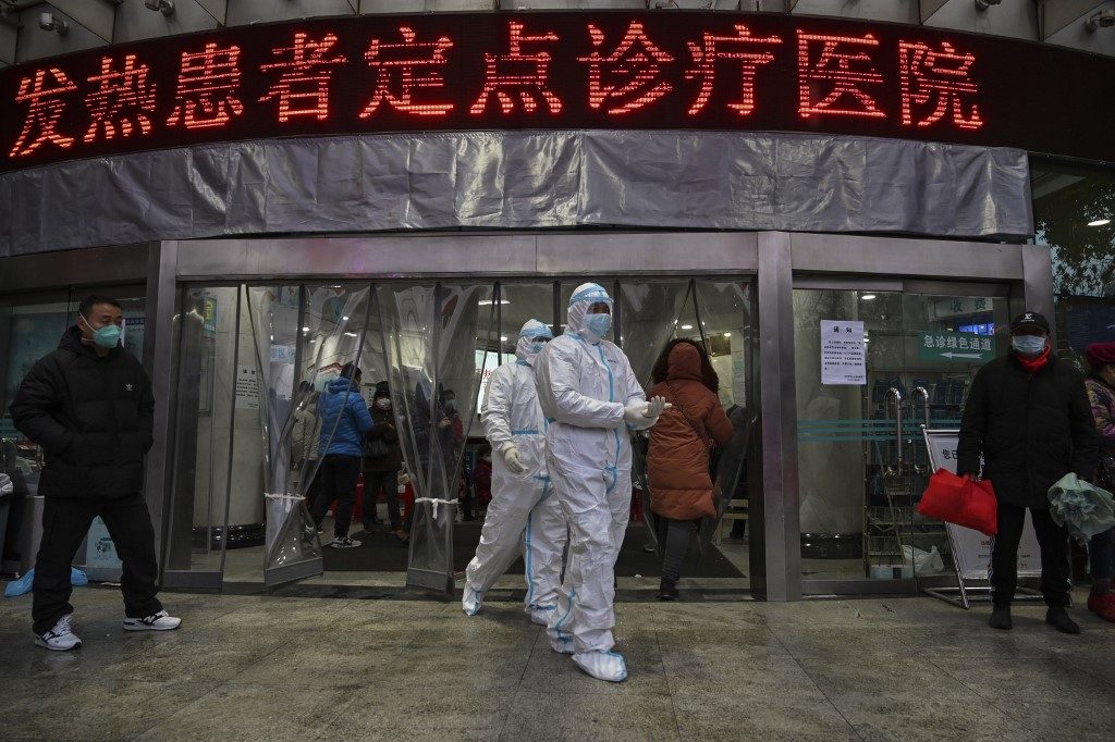 Red Cross official fired for failures at China virus epicenter