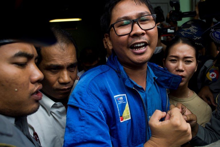 Myanmar court remands Reuters journalists for 2 more weeks