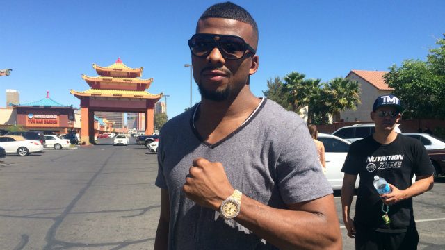 Badou Jack shows off the gold diamond encrusted Rolex that Floyd Mayweather Jr gifted him for winning a world championship. Photo by Ryan Songalia 