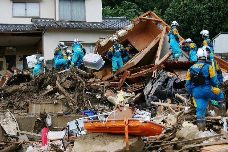 Rescuers comb through devastation of Japan landslide