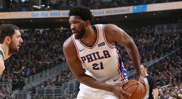 Sixers beat East-leading Bucks to clinch playoffs spot