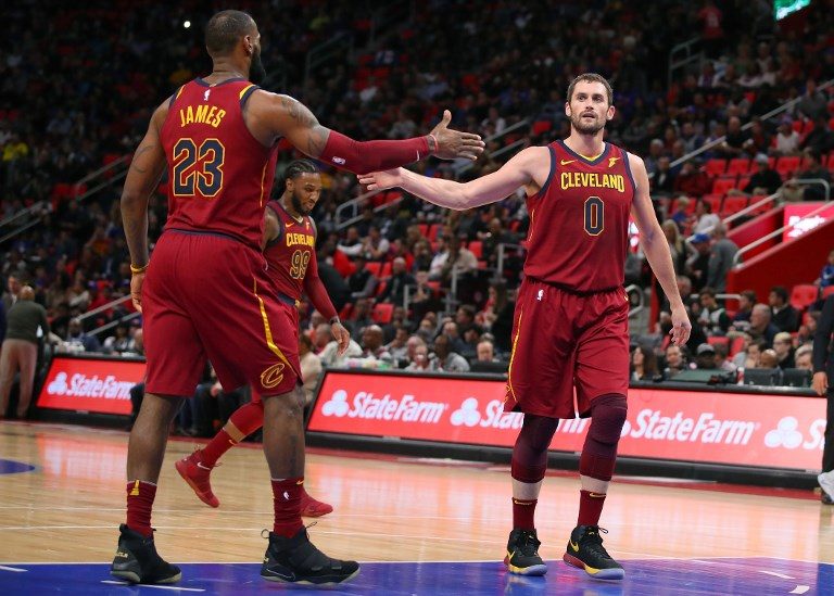 GOOD JOB. Kevin Love #0 of the Cleveland Cavaliers and LeBron James #23 celebrate a shot while playing the Detroit Pistons at Little Caesars Arena on November 20, 2017 in Detroit, Michigan. Photo by Gregory Shamus/Getty Images/AFP 