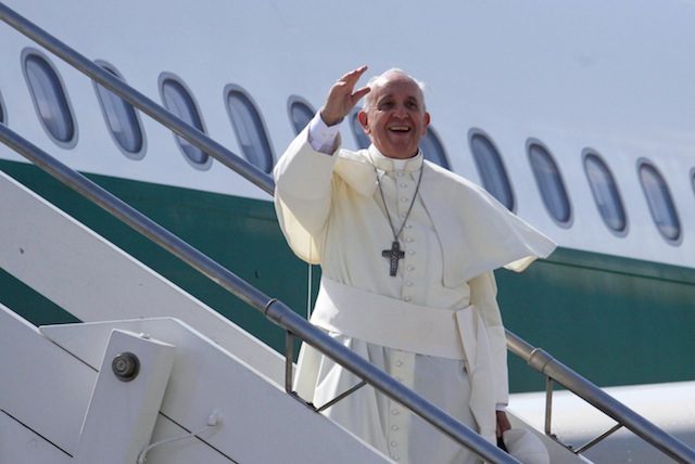 NEXT STOP: ASIA. Pope Francis waves as he boards his plane at the Fiumicino airport, Rome, Italy, 13 August 2014. Alessandro di Meo/EPA