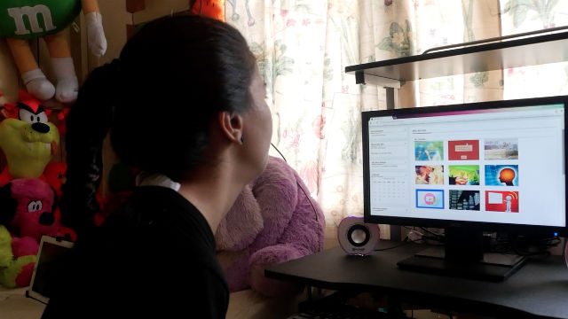 NO EXCUSE. Tuesday has been using the computer to educate herself most of her life. Photo by Franz Lopez/ Rappler 