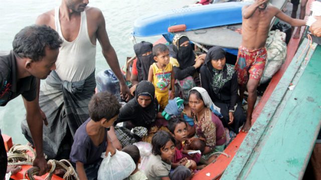 Swap places with boat migrants, Thai PM tells critics
