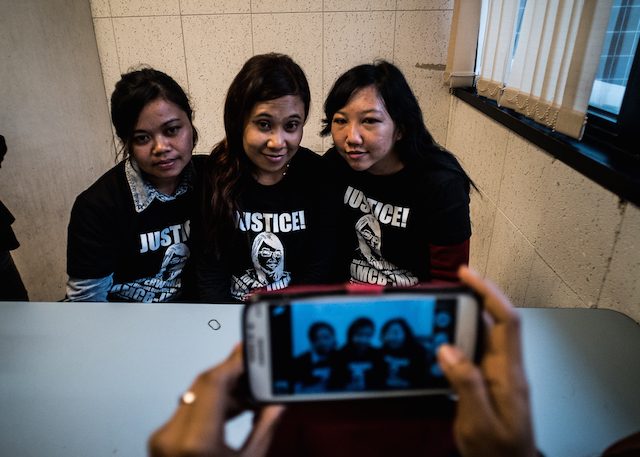 Erwiana with her friends inside the Hong Kong courtroom where Law was sentenced to 6 years in prison. Photo by Xyza Cruz Bacani/Rappler 