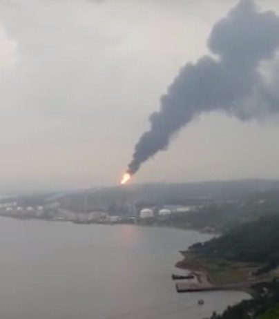 PLUMES. Large clouds of grey smoke issue from the JG Summit plant in Batangas. Screengrab from Facebook video of Aj Soriano   