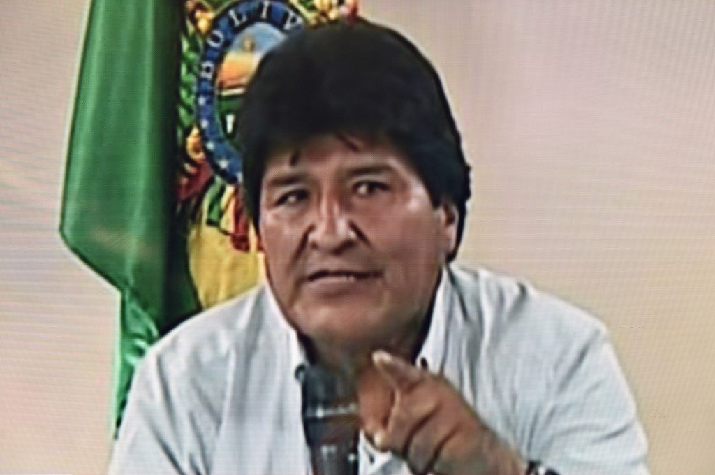 Morales begins Mexico exile as Bolivia moves to end vacuum