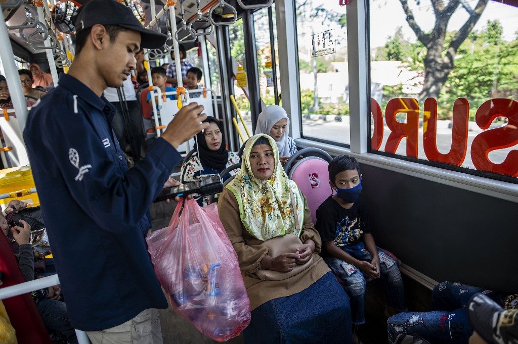 Swap trash for tickets on Indonesia’s ‘plastic bus’