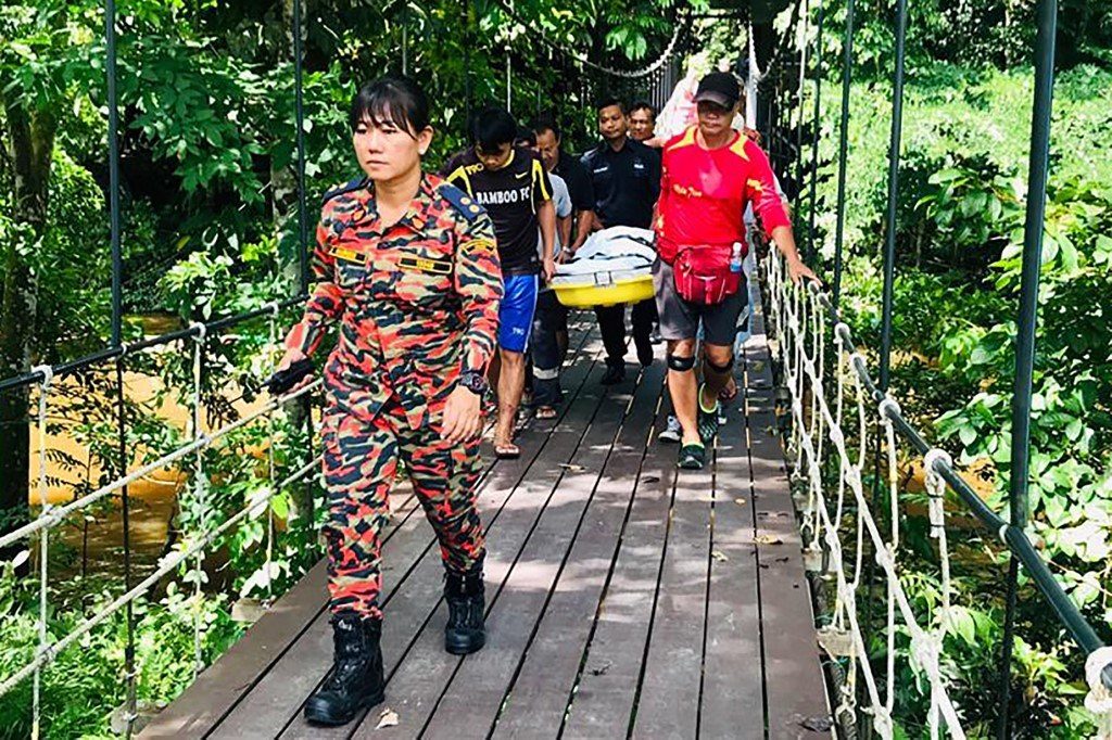 Dutch tourist killed in Malaysia cave floods, guide missing