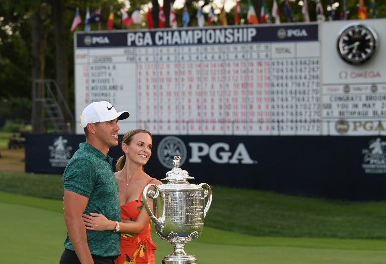 Koepka holds off Woods to win 100th PGA Championship