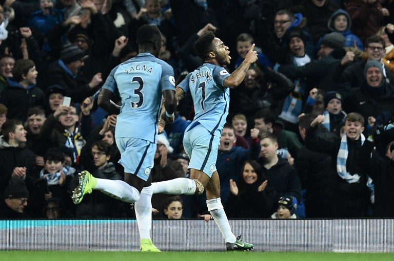 Sterling sinks Arsenal to reignite Man City