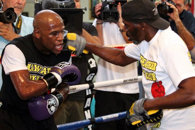 WATCH: Floyd Mayweather chops wood, trains for Pacquiao
