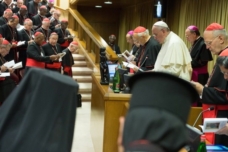 A handout picture provided by the Vatican newspaper L'Osservatore Romano on 07 October 2014 shows Pope Francis (3-R) leading the extraordinary Synod of bishops on family, at the Vatican, 06 October 2014. L'Osservatore Romano/EPA