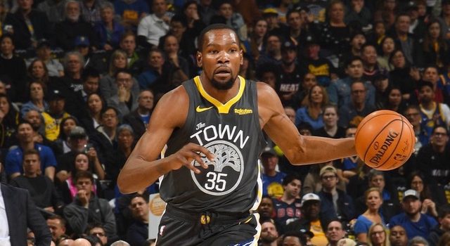Durant catches fire as Warriors cool Heat