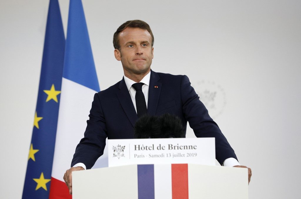 MACRON. French President Emmanuel Macron delivers a speech at the residence of French Defense Ministry on the eve of Bastille Day, on July 13, 2019, in Paris. File photo by Kamil Zihnioglu/AFP 