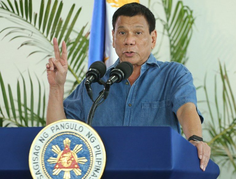 DUTERTE. This file photo taken on October 16, 2016 shows Philippine President Rodrigo Duterte as he gestures delivering his speech prior to departing for a visit to Brunei and China at Davao airport. File photo by Manman Dejeto/ AFP 