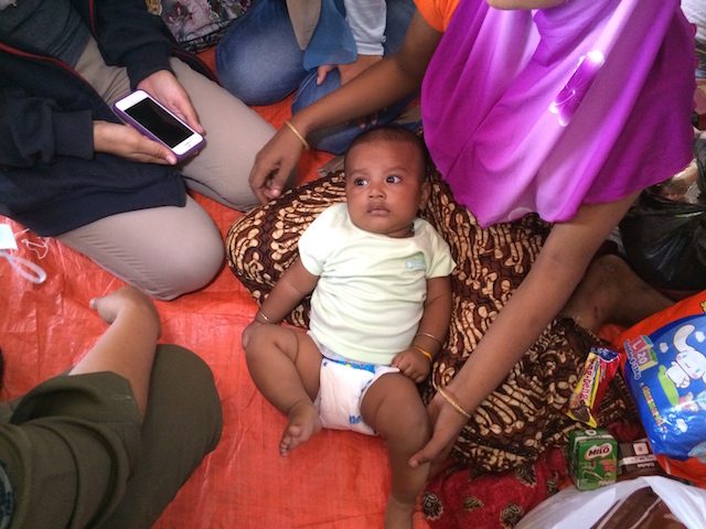 Muhammad Mahi masih berumur 1 bulan saat ibunya yang seorang Rohingya membawanya menyeberang ke Malaysia menggunakan perahu. Ibunya ingin mempertemukan Mahi dengan ayahnya. Foto oleh Febriana Firdaus/Rappler 