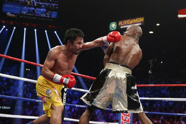 Manny Pacquiao lost a unanimous decision to Floyd Mayweather in his most recent fight. Photo by John Gurzinski/AFP 