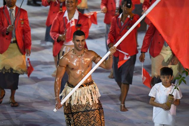 Greased-up Tongan flag bearer at Rio Olympics turns to Winter Games
