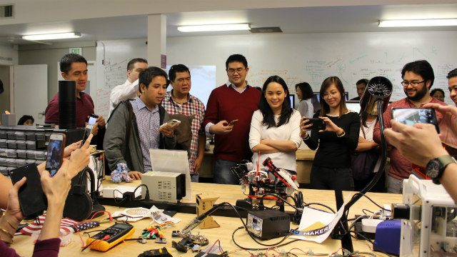 The participants observe some of the live demonstration of a prototype project during one of their tours in in Singularity University.
  