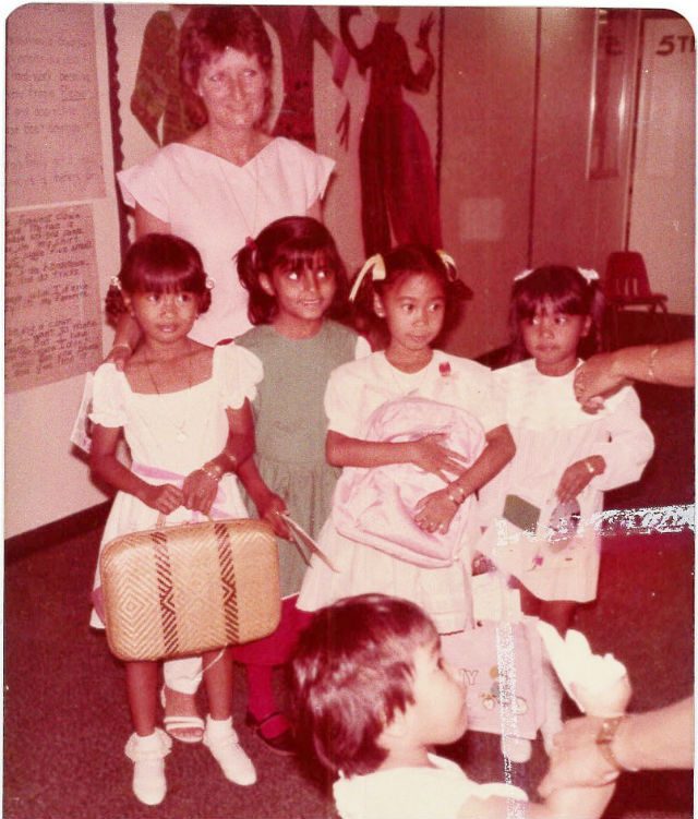 KINDERGARTEN GRADUATION:. The author (with rattan bag) and her best friend V. (third from left) with their teacher Mrs. J. at their graduation, June 1985. 
