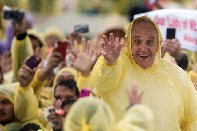 CLIMATE ACTIVIST. Pope Francis lends his voice to the climate change debate through his landmark encyclical 'Laudato Si.' Photo by Johannes Eiselle/AFP 