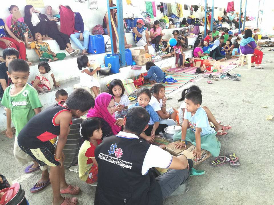 Caritas PH brings P10-M aid to home-based Marawi evacuees