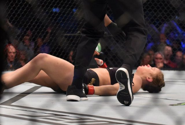 Ronda Rousey was stunned by a punch, downed by a kick to the head and finished off with hammer strikes. Photo by Paul Crock/AFP 