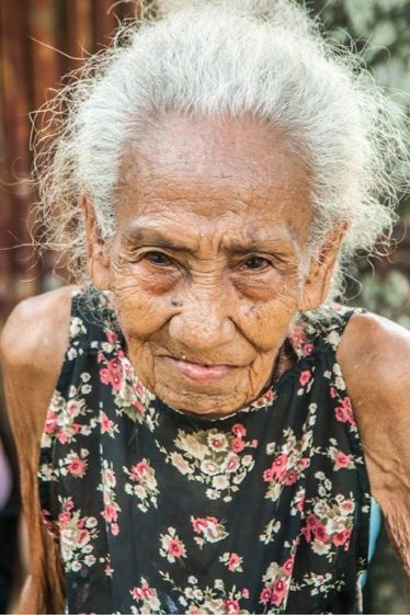 LIFE PERSISTS. This 97-year-old Aeta native of Sitio Nagpana, Barotac Viejo is among the 840 residents dependent on an agricultural economy heavily affected by typhoon Yolanda. Only 30% of the community’s coffee plantation has recovered after a year.