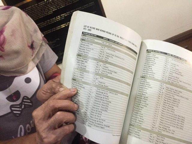 PART OF LIST. Luzviminda Guinto shows his husband name in the list of Martial Law victims. Photo by Jodesz Gavilan/Rappler 