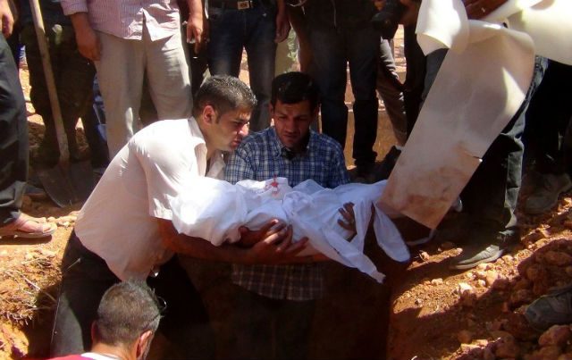 Father buries his drowned toddler, family in Syria