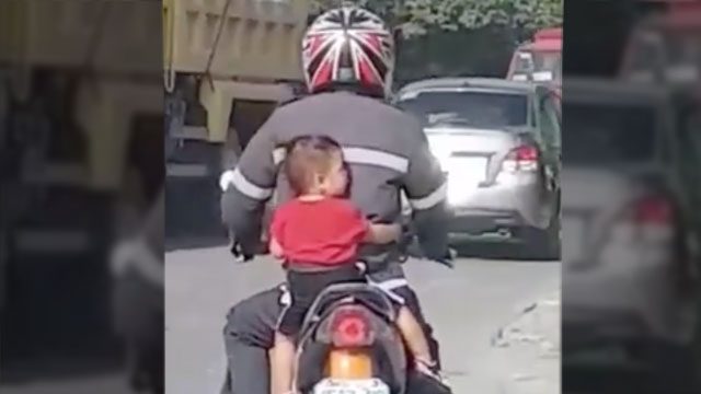 VIRAL: Toddler with no helmet behind motorcycle rider