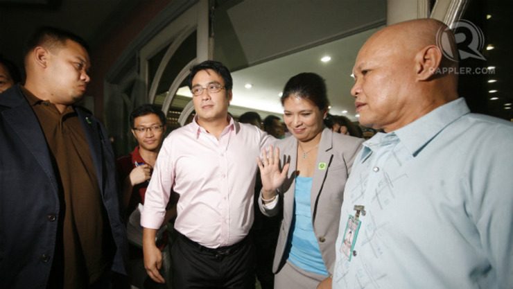 REVILLA COUPLE. Senator Bong Revilla and his wife Lani leaves the court room after the morning session of the senator's bail hearing. Photo by Ben Nabong/Rappler