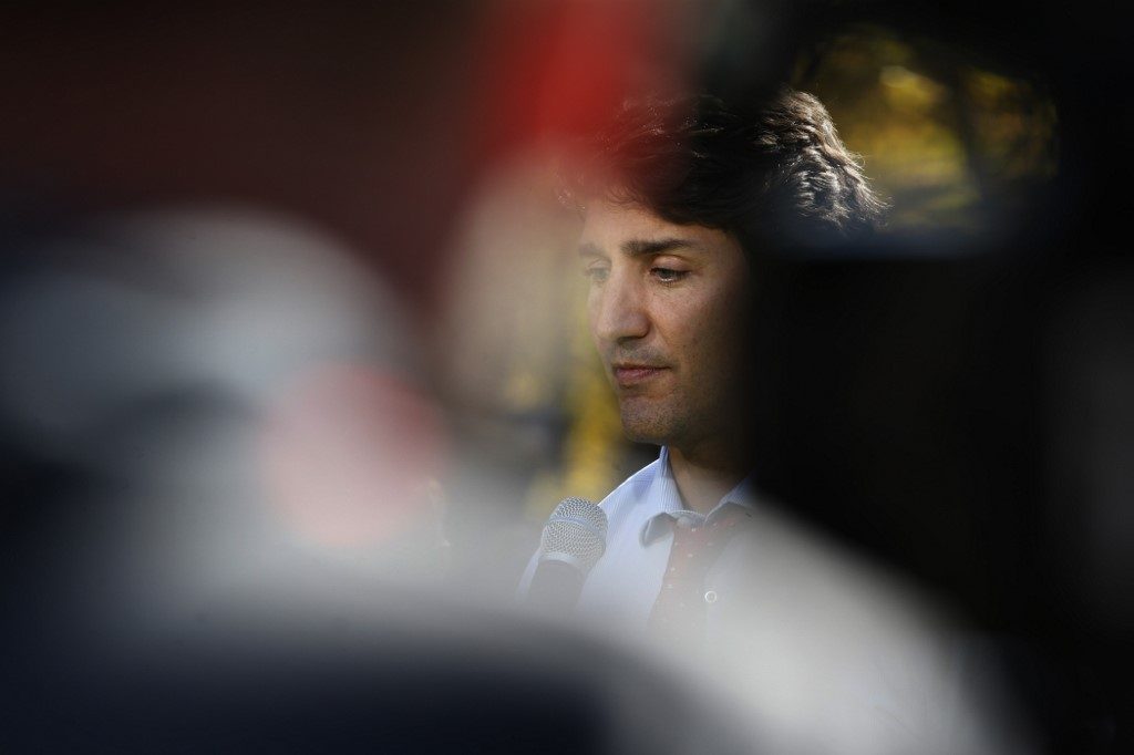 Justin Trudeau apologizes again for wearing blackface as new images emerge