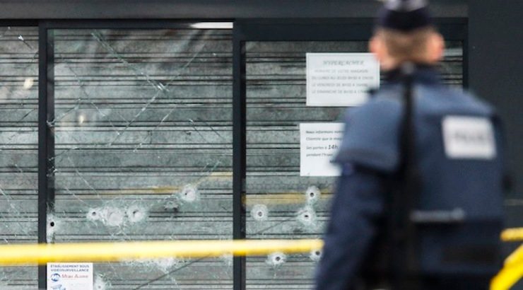 BULLET HOLES. View of shooting impacts on door of HyperCacher supermarket at Porte de Vincennes in eastern Paris, a day after a gunman took hostages and opened fire, France, 10 January 2015. Olivier Hoslet/EPA