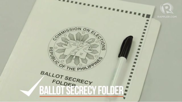 PROTECT YOUR VOTE. No one else is allowed to see your ballot. Protect it using the Comelec ballot secrecy folder. Do not take photos or makes copies of your ballot. File photo by Rappler 