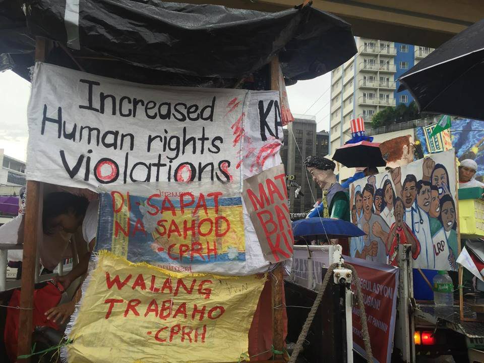 RALLY. Trucks raise banners asking the Duterte administration to stop human rights violations
   