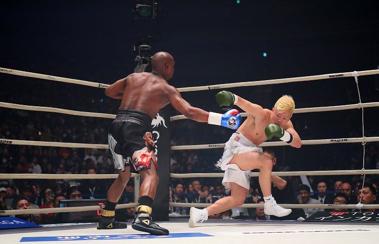 JAPAN. Floyd Mayweather beat Japanese kickboxing phenomenon Tenshin Nasukawa by a technical knock-out in the first round of a New Year's Eve "exhibition" bout that brought the US boxing superstar out of retirement. Photo by Handout / 2015 RIZIN FF / AFP 