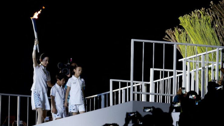 Symbolic flame goes out on Asiad‎