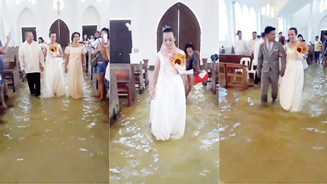 LOOK: Wading, uh, wedding in floodwater