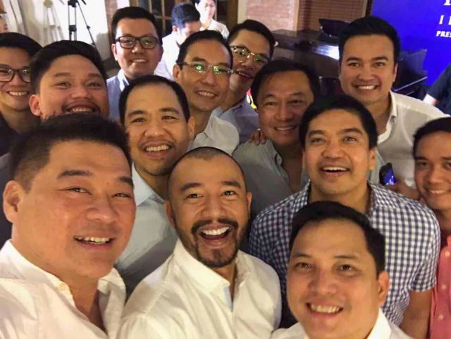 SELFIE TIME. Velasco (first from right, in white) and Alvarez (2nd from right, in light blue) smile for a selfie with the other party guests. Photo from Dy  