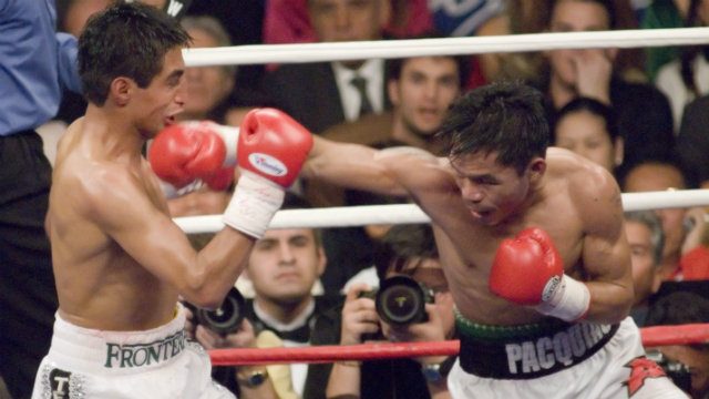 Despite a mutual respect and friendship, Pacquiao knocked Erik Morales out twice and ended his career as a top fighter. Photo by Gary Williams/EPA
