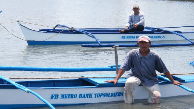 BIG HELP. A recipient of the “Bangka ng Buhay, Bunga ng Bayanihan” project with his motor boat.