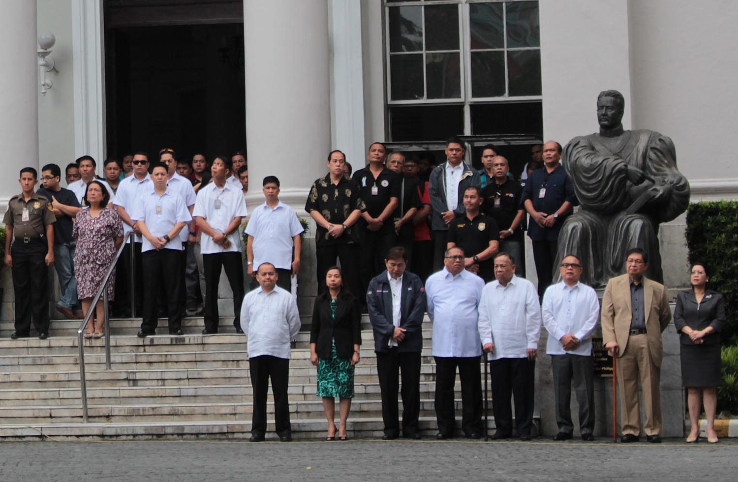 'BLACK MONDAY.' Sereno and Supreme Court justices attend the flag-raising ceremony on the day employees of the judiciary protested President Aquino's criticism of the Supreme Court over DAP. File photo by Joel Leporada/Rappler  