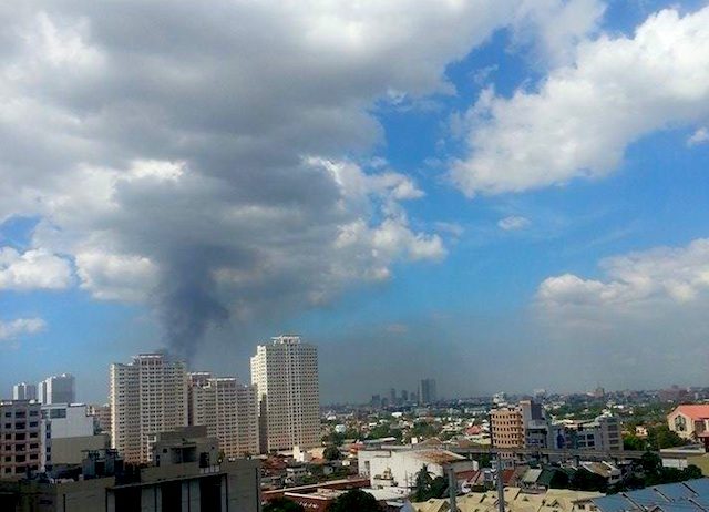 FIRE IN QUEZON CITY. Smoke rises from the site of a fire in Quezon City on December 4, 2015. Photo courtesy of Philip Fortuno 