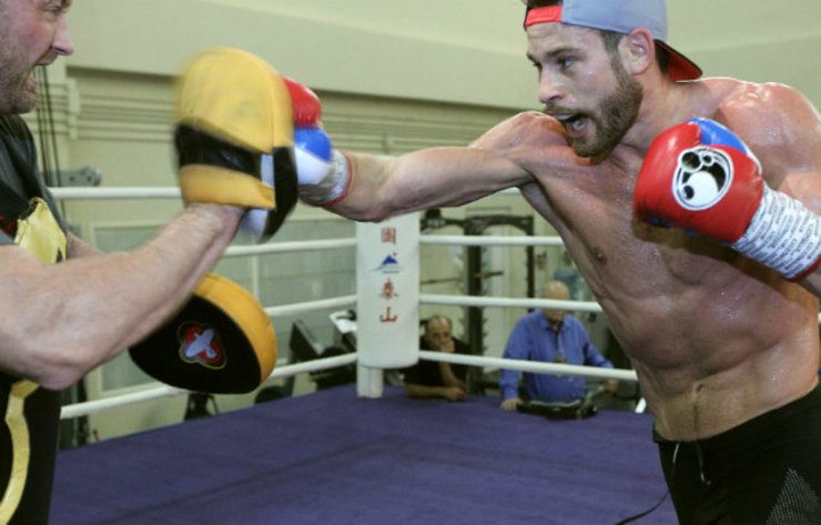 Chris Algieri lands a right cross on the punch mitts. File photo by Chris Farina - Top Rank