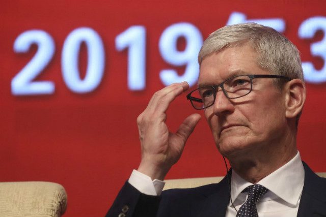 Apple’s Tim Cook urges China to continue to open up its economy